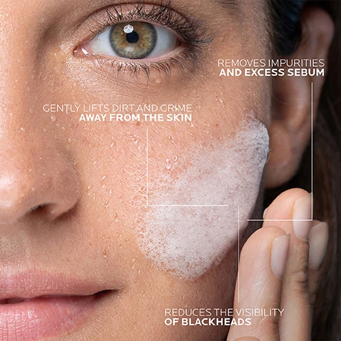 Image 1 - A close-up image of a woman’s face showing her applying a foamy cleanser to her cheek, with droplets of water on her skin and text highlighting product benefits: removes impurities and excess sebum, gently lifts dirt and grime away from the skin, reduces the visibility of blackheads.
Image 2 - A tube of La Roche-Posay Effaclar purifying foaming gel with a blue label, accompanied by instructions numbered 1 and 2, stating MORNING OR EVENING MASSAGE ONTO WET SKIN and RINSE AND PAT DRY.
Image 3 - Image depicts three skincare products from La Roche-Posay, labeled as 1, 2, and 3, with visible text reading EFFACLAR PURIFYING FOAMING GEL, EFFACLAR DUO+M, and ANTHELIOS OIL CONTROL.
Image 4 - A close-up image of a foamy, translucent cleanser with bubbles on a white surface, surrounded by text stating Removes impurities and excess sebum, Gently lifts dirt and grime away from the skin, and Reduces the visibility of blackheads.
Image 5 - A blue cleansing gel tube labeled La Roche-Posay Effaclar Purifying Foaming Gel with the text NON-DRYING REFRESHING CLEANSING GEL on a light blue background.
Image 6 - Image depicts a La Roche-Posay graphic with the following elements: a line drawing of a dermatologist, the text Recommended by Dermatologists, a line drawing of a woman with her hand on her face, the text Suitable for Sensitive Skin, a water drop symbol with a slash, the text For Oily, Combination, Blemish-Prone Skin, a line drawing indicating non-comedogenic, and the text Non-Comedogenic.
Image 7 - An image of a blue tube of La Roche-Posay Effaclar Foaming Gel positioned beside various shades of skin, with the text EFFACLAR FOAMING GEL SUITABLE FOR ALL SKIN TYPES prominently displayed.
Image 8 - Image shows two tubes of La Roche-Posay Effaclar purifying foaming gel side by side, the left tube has the text New pack, same great results above it, while the right tube has additional text Microbiome Science and Balance skin pH.