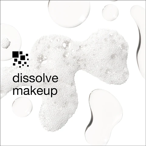 Image 1 - An abstract arrangement of bubbles and droplets on a white background with the text dissolve makeup prominently displayed.
Image 2 - A transparent bottle is partially shown in the foreground with a light green striped background, and it features a list stating Free of followed by checked boxes for fragrance, gluten, sodium lauryl sulfate, and sodium laureth sulfate.