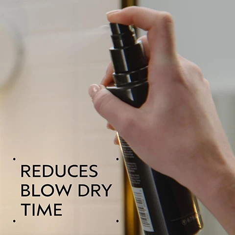 Image 2 - A hand presses a black spray bottle, releasing a fine mist, with the text REDUCES BLOW DRY TIME visible on the left. Image 3 - A dark green graphic with a circular central image showing blurred bright green plant leaves, featuring white text that reads LACTIC ACID FROM PLANTS HELPS SMOOTH AND SEAL THE CUTICLE. Image 4 - The image shows a split panel comparison of a woman with long red hair: on the left, her hair is wavy and appears somewhat frizzy, and on the right, her hair is straight, smooth, and shiny. Visible text in the image reads: BEFORE, AFTER, Unwashed Hair, Results with Cherry Almond Softening Shampoo and Conditioner, Speed of Light Blow Dry Accelerator, Thickening Tonic, Botanical Repair™ Bond-Building Styling Crème, and Air Control Light Hold Hair Spray. Blow dried with Wooden Paddle Brush. Image 5 - The image depicts a four-step hair care routine with circular insets showing a person cleansing hair with shampoo, a hand dispensing conditioner, a hand spraying a prep product, and a collection of styling products with a brush, with visible text that reads: HOW TO USE, 01 CLEANSE Cherry Almond Softening Shampoo, 02 CONDITION Cherry Almond Conditioner, 03 PREP Speed of Light Blow Dry Accelerator, 04 STYLE Thickening Tonic, Botanical Repair™ Bond-Building Styling Crème, Air Control Light Hold Hair Spray & Wooden Paddle Brush. Image 6 - Three white certification logos are displayed against a dark green tropical plant background with green striped leaves and a red plant stem, showing 100% VEGAN, Certified B Corporation, and Cruelty Free INTERNATIONAL.