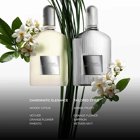 Image 1 - Image shows two Tom Ford Grey Vetiver perfume bottles, one clear and one silver, surrounded by green leaves and white flowers, with text listing characteristics: Charismatic Elegance with Woody Citrus, Vetiver, Orange Flower, Pimento; and Tailored Style with Amber, Fruity, Orange Flower, Saffron, Vetiver Haiti.