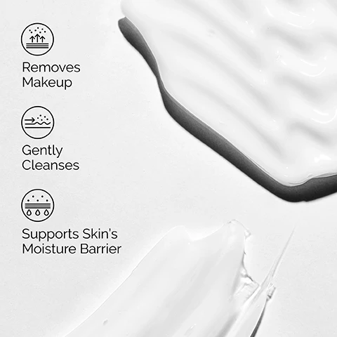 Image 1 - A smooth, white cream is shown on a light background with three bullet points next to it that read Removes Makeup, Gently Cleanses, and Supports Skins Moisture Barrier.
Image 2 - A close-up of a persons face showing them applying a translucent cleansing product to their cheek, with text elements stating Gently Cleanses and Removes Makeup.
Image 3 - A close-up of a cream dispenser with a white lotion oozing out, alongside text that reads Key ingredient: Squalane and supports the skin barrier for hydrated skin.
Image 4 - A person wearing a white hijab is applying a balm-to-oil cleanser to their face while text on the right lists instructions: Balm-to-oil texture: Massage onto dry face, Rinse.
Image 5 - Image depicts three skincare products by The Ordinary: Squalane Cleanser on the left, Hyaluronic Acid 2% + B5 in the center, and Natural Moisturizing Factors + HA on the right, with text above stating Build Your Regimen: and product descriptions below each item indicating their purpose.
Image 6 - Image shows three cleanser tubes from The Ordinary, labeled as Glucoside Foaming Cleanser, Glycolipid Cream Cleanser, and Squalane Cleanser, with descriptions of their properties and suitability for different skin types displayed below each tube.
Image 7 - Image shows two tubes of facial cleanser from The Ordinary, one 150 mL standard size and one 50 mL mini size, with text that reads Explore 2 Sizes, 150 mL Standard Size, and 50 mL Mini Size, Suitable for Travel.