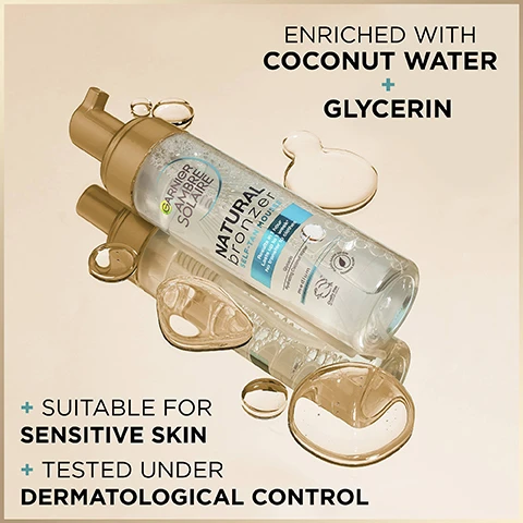 Image 1 - A Garnier Ambre Solaire Natural Bronzer Self-Tan Mousse bottle is shown on a reflective surface with liquid droplets, with text reading ENRICHED WITH COCONUT WATER + GLYCERIN and + SUITABLE FOR SENSITIVE SKIN + TESTED UNDER DERMATOLOGICAL CONTROL. Image 2 - Image shows a hand dispensing Garnier Ambre Solaire Natural Bronzer Self-Tan Mousse into another hand with visible text Lightweight Mousse Texture, + Easy To Apply, + Streak-Free, + Non-Sticky, + Dries Quickly, Results in 1 hour Lasts up to 1 week No transfer to clo, Hydrating Coconut, medium, 200 ml 6.7 fl oz. Image 3 - A persons torso with tanned skin, arms crossed, wearing underwear, shows the text STREAK-FREE, QUICK DRY, NATURAL TAN, LASTS UP TO 1 WEEK*, TRANSPARENT FORMULA - COCONUT FRAGRANCE, *INSTRUMENTAL TEST, 22 SUBJECTS AFTER 1 APPLICATION. Image 4 - A hand holds a Garnier Ambre Solaire Natural Bronzer Self-Tan Mousse bottle next to a list of application steps: HOW TO APPLY 1. EXFOLIATE SKIN 2. APPLY ON DRY SKIN 3. BLEND EVENLY 4. SMOOTH ELBOWS AND KNEES 5. REAPPLY AS NEEDED. Image 5 - An image shows four Garnier Natural Bronzer self-tanning products including face drops, mist, mousse, and lotion with text labels reading GRADUAL, NATURAL FACE TAN DROPS WITH HYALURONIC ACID, EASY, QUICK-DRYING TAN MIST WITH VITAMIN E, 1-WEEK TAN WITH WEIGHTLESS, QUICK-DRY MOUSSE, HYDRATING TAN LOTION, and the title NATURAL BRONZER. Image 6 - An image displays the Garnier Ambre Solaire logo, a blue banner stating A STRICT FORMULATION CHARTER, and six points with icons listing benefits Plant-Based Origin Tanning Active, Streak Free, Cruelty Free International, Quick-Dry Formula, 24 Hours Hydration, and Tested Under Dermatological Control.