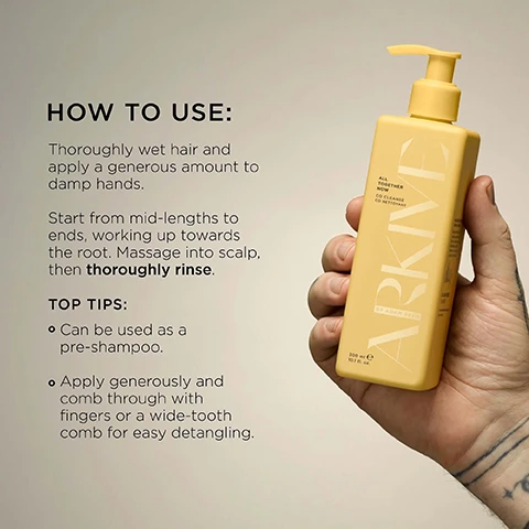 Image 3 - A persons hand holds a yellow ARKIVE pump bottle against a light background, with instructions and tips next to it. Text reads: HOW TO USE: Thoroughly wet hair and apply a generous amount to damp hands. Start from mid-lengths to ends, working up towards the root. Massage into scalp, then thoroughly rinse. TOP TIPS: Can be used as a pre-shampoo. Apply generously and comb through with fingers or a wide-tooth comb for easy detangling. On the bottle: ALL TOGETHER NOW CO CLEANSE CO NETTOYANT ARKIVE BY ADAM REED 300 ml e 10.1 fl. oz. Image 4 - A light yellow pump bottle labeled ARKIVE ALL TOGETHER NOW CO CLEANSE CO NETTOYANT BY ADAM REED 300 mL e 10.1 FL. OZ. (US) is placed on a white radiator against a textured yellow wall, with accompanying text explaining Sugar-Based Cleanser gently clarifies, Aloe Vera soothes the scalp & deeply hydrates hair, and Baobab Protein promotes strength & elasticity. Image 6 - A hand holds a yellow pump bottle featuring the vertical brand name ARKIVE and smaller text ALL TOGETHER NOW CO CLEANSE CO NETTOYANT, 300 ml e 10.1 fl. oz., positioned in front of a misty mirror that reveals a greenery reflection and prominently displays the text MADE WITHOUT: ALUMINIUM LACTOSE AMMONIA MINERAL OIL LATEX PARABENS SILICONE GLUTEN TALC, as well as various icons with accompanying text: Vegan, Certified B Corporation, MADE WITH RECYCLED CONTENT, Cruelty Free International, and AWARD WINNING.