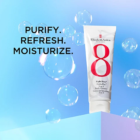 Image 1 - A tube of Elizabeth Arden Eight Hour HydraPlay 2-in-1 Daily Cleanser is shown against a blue background with bubbles, accompanied by the text Purify. Refresh. Moisturize.
Image 2 - A creamy, light pink clay cleanser with a whipped mousse texture is shown alongside labels that read Clay cleanser, Mineral-rich, and Whipped mousse texture.
Image 3 - A split image showing a womans face before and after using a skincare product, with the left side labeled BEFORE and the right side labeled IMMEDIATELY AFTER, and featuring the text 96% agree skin looks healthy* at the bottom.
Image 4 - An image of a hand holding a tube of Elizabeth Arden Eight Hour HydraPlay 2-in-1 Daily Cleanser against a colorful background, with eight benefits listed alongside the product: Non-stripping, Purifies, Refreshes, Minimizes pores, Pre/Post biotics, Absorbs oils, Non-comedogenic, Soothes.
Image 5 - A smiling person with red hair and freckles is facing the camera against a blue background, with the text 80% saw reduction in pores* displayed prominently below.
Image 6 - A tube of Elizabeth Arden Eight Hour HydraPlay 2-in-1 Daily Cleanser is shown against a light blue background, with creamy cleanser swirled on the side; the text outlines usage instructions: WASH OFF IMMEDIATELY to cleanse skin and LEAVE ON FOR 1 MINUTE as a quick mask.
Image 7 - A tube of Elizabeth Arden Eight Hour HydraPlay 2-in-1 Daily Cleanser is placed on a round surface alongside a glass jar of cotton swabs and a toothbrush holder, with the text 94% agree skin looks cleaner and a note about the consumer study at the bottom.
Image 8 - Image shows three glass dishes on a light blue background containing different skincare ingredients: a dish with pink kaolin clay labeled PINK KAOLIN CLAY extracts dirt, oil & impurities, a dish with a clear gel containing bubbles labeled PRE/POST BIOTICS support & balance skin’s microbiota, and a dish with liquid droplets labeled GLYCERIN hydrates, softens & smooths.
Image 9 - A flat lay of four Elizabeth Arden Eight Hour skincare products on a light blue background, with a circular red badge stating EIGHT HOUR® FAMILY 190+ Beauty Awards Worldwide.