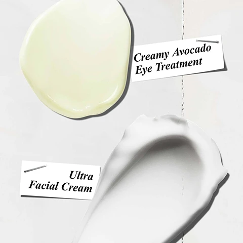 Image 1 - An image showing two different skincare products: a yellowish cream labeled Creamy Avocado Eye Treatment and a white cream labeled Ultra Facial Cream, both displayed on a light background.
Image 2 - A split image shows a close-up of a fair-skinned person applying eye cream under one eye, while a darker-skinned person applies moisturizer to their cheek, with the words HYDRATING Eye Cream and HYDRATING Moisturiser visible at the bottom.
Image 3 - An image of two Kiehls skincare products on a wet surface; the first is the Ultra Facial Cream labeled Helps repair skin barrier in 1 hr, and the second is the Creamy Eye Treatment with Avocado, labeled Hydrates eyes.
Image 4 - An illustration featuring an avocado sliced in half with a visible pit, alongside droplets of water and a label that lists Squalane and Avocado Oil as ingredients, on a bright blue background.
Image 5 - A persons open hand is shown with a small amount of eye cream on the tip of their finger, alongside a text box that reads DID YOU KNOW? Warm the eye cream between your fingers to transform the formula into a refreshing burst of hydration.